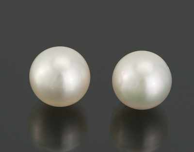 Appraisal: A Pair of South Sea Pearl Earrings k yellow gold