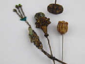 Appraisal: A mixed lot comprising two Oriental hair ornaments one set