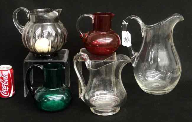 Appraisal: Lot five misc clear and colored glass pitchers '' to