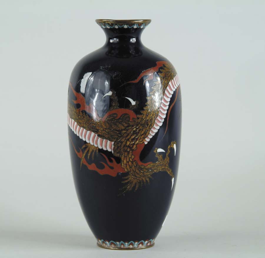 Appraisal: CLOISONN DRAGON VASE Cobalt blue ground having colorful dragon surrounding