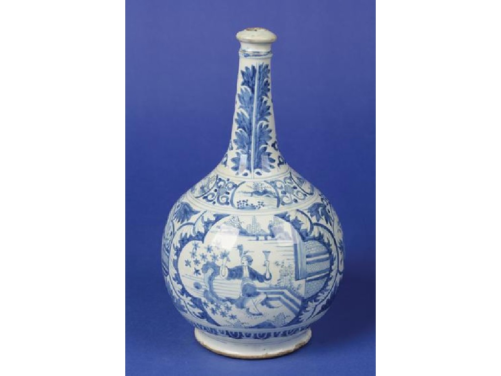 Appraisal: A DELFTWARE BLUE AND WHITE BOTTLE VASE decorated with shaped