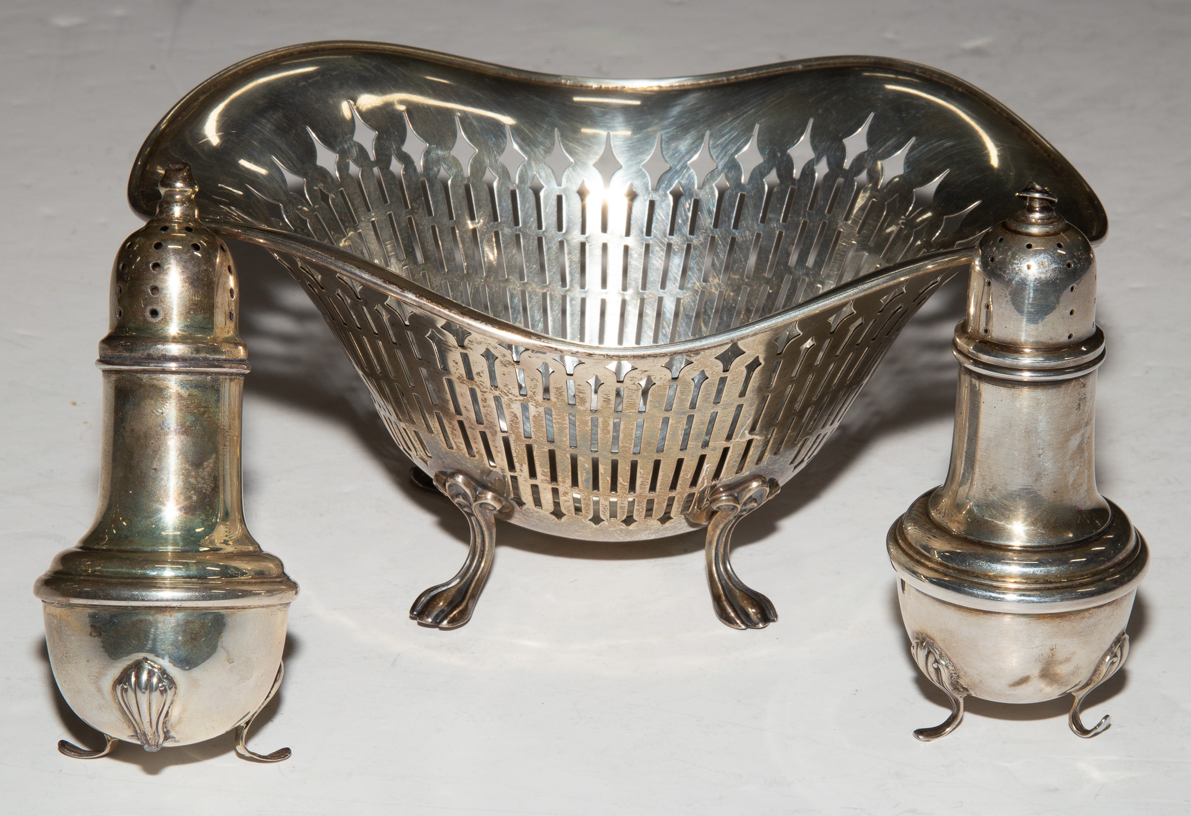 Appraisal: THREE PIECES STERLING HOLLOWWARE Including a Towle basket in H