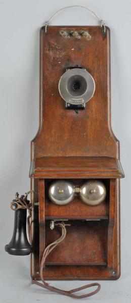 Appraisal: Western Electric A Fiddleback Telephone Description Circa Walnut and transmitter