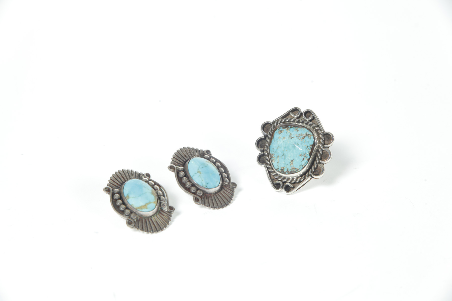 Appraisal: NAVAJO RING AND PAIR OF EARRINGS Second half- th century