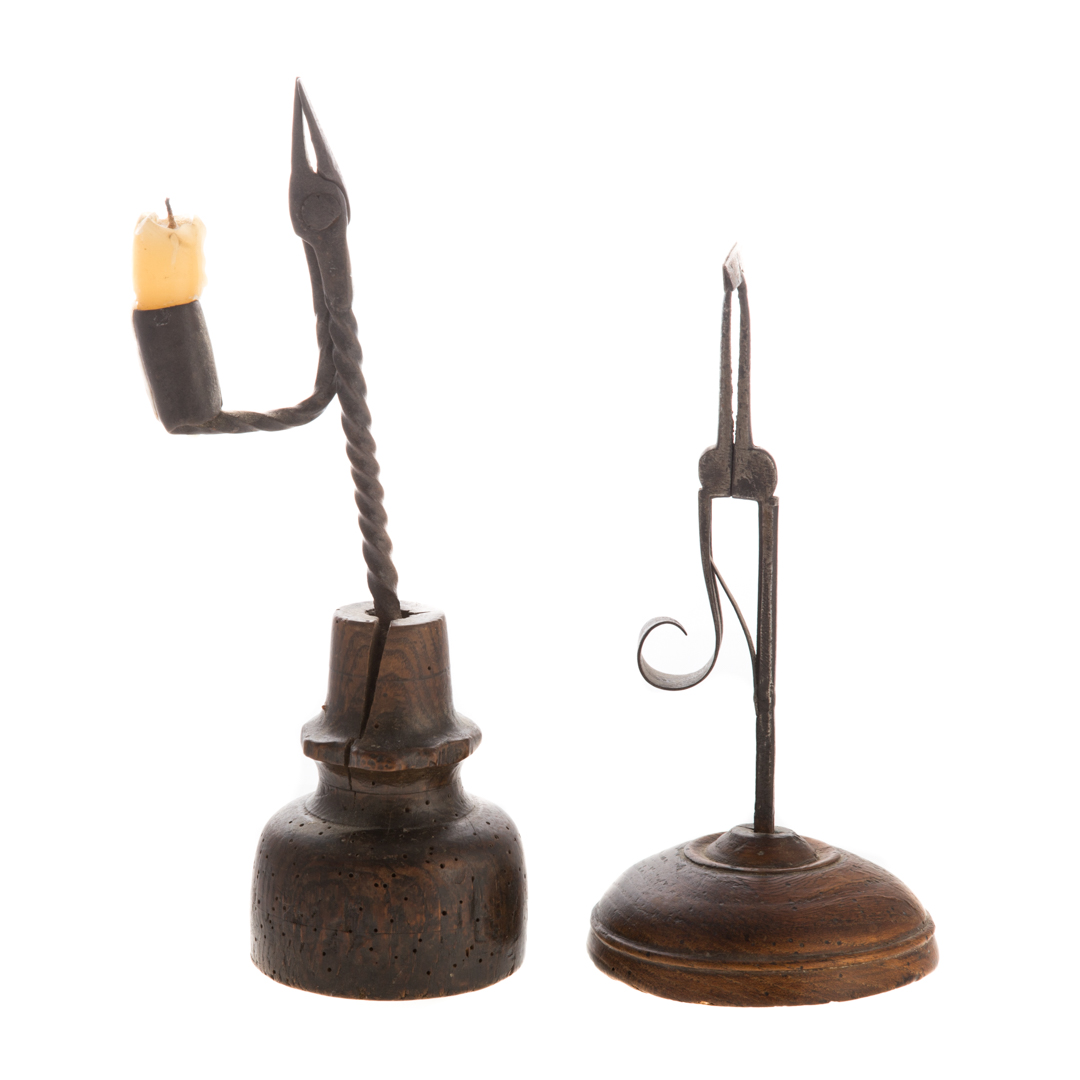 Appraisal: Two early American lighting devices th century including wrought iron