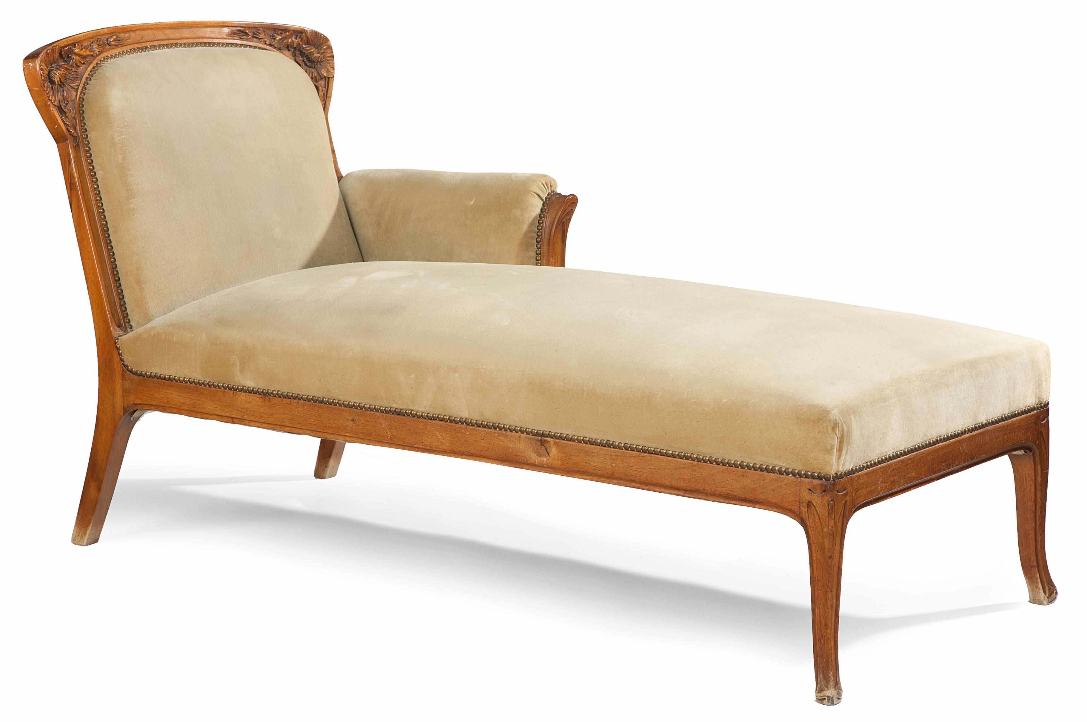 Appraisal: An Art Nouveau carved walnut chaise longue attributed to Louis