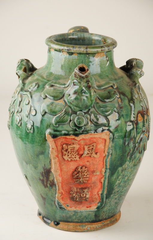 Appraisal: An Early Chinese Pottery Jug Possibly th C having a