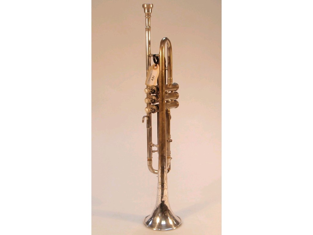 Appraisal: An American plated trumpet by C G Conn Ltd Elkheart