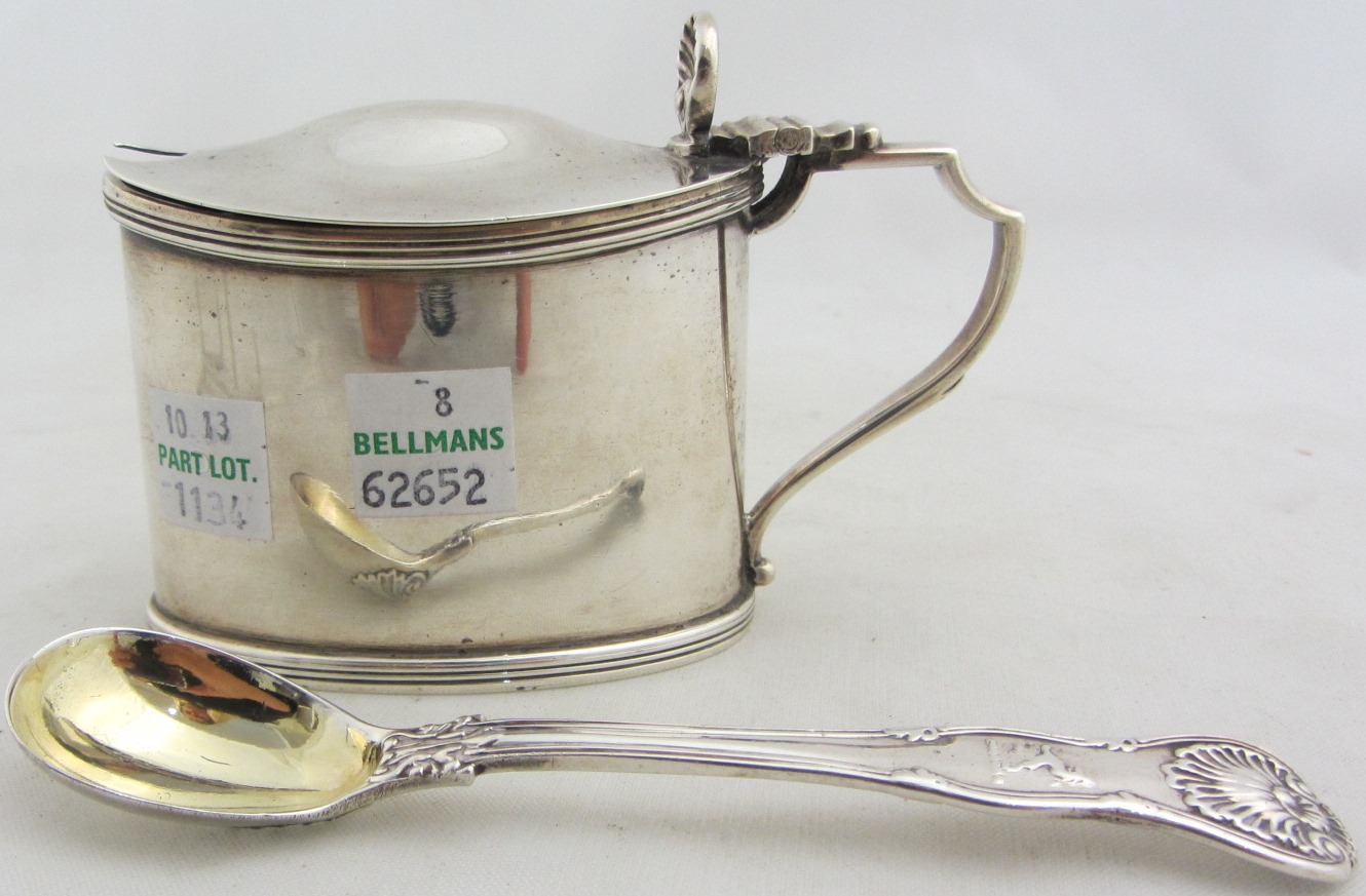 Appraisal: A silver mustard pot of oval form decorated with reeded