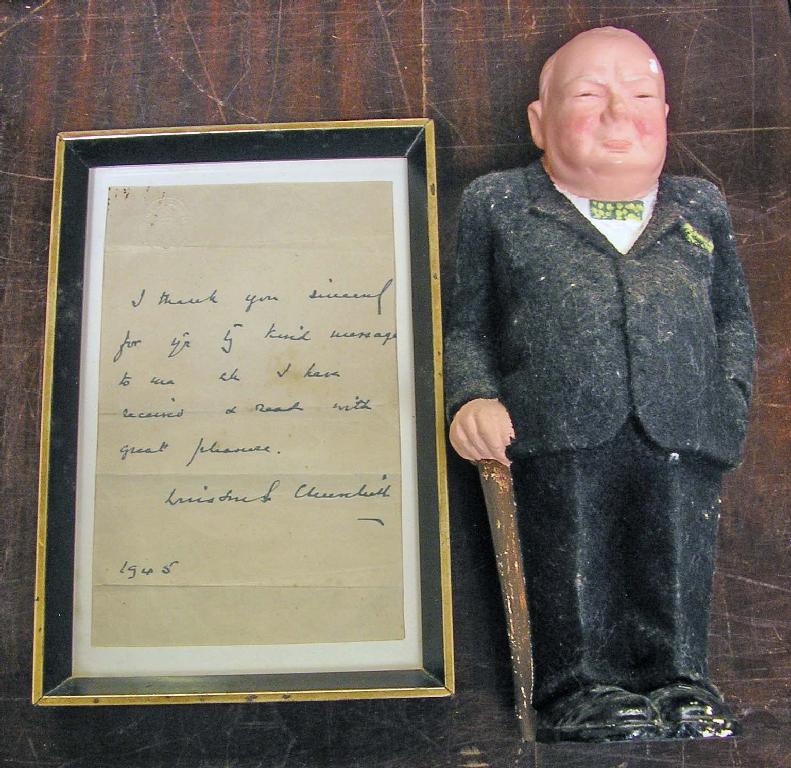 Appraisal: A plaster model of Winston Churchill together with an accompanying