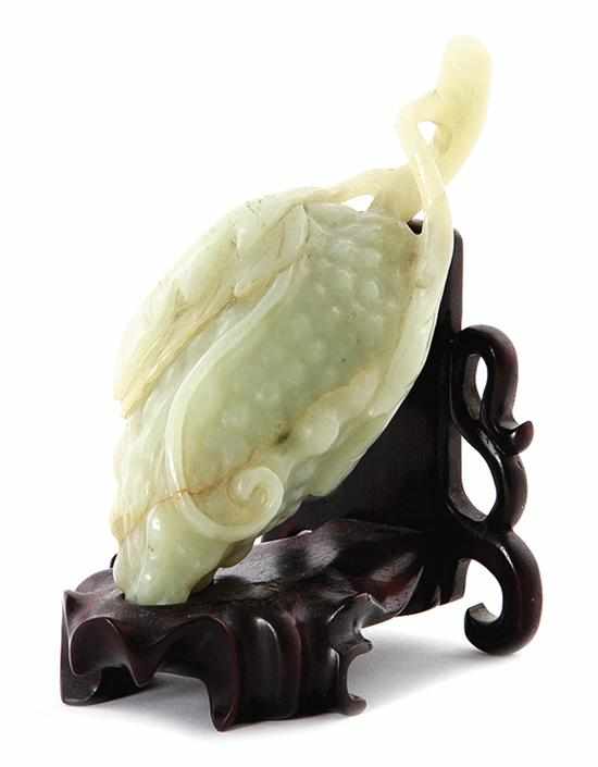 Appraisal: Japanese carved jade cluster of grapes th century pale green