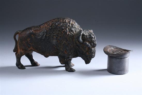 Appraisal: TWO CAST IRON STILL BANKS Buffalo and top hat PROVENANCE