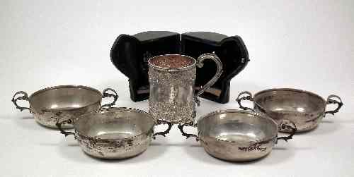 Appraisal: A set of four George V silver circular two-handled porringers