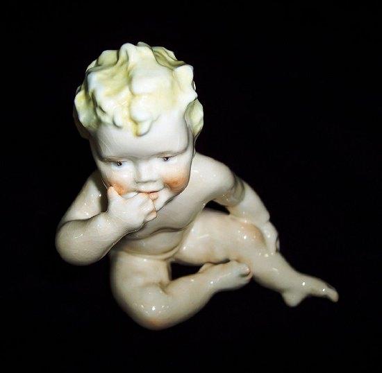 Appraisal: A Royal Worcester figure by Freda Doughty Sitting Child cm