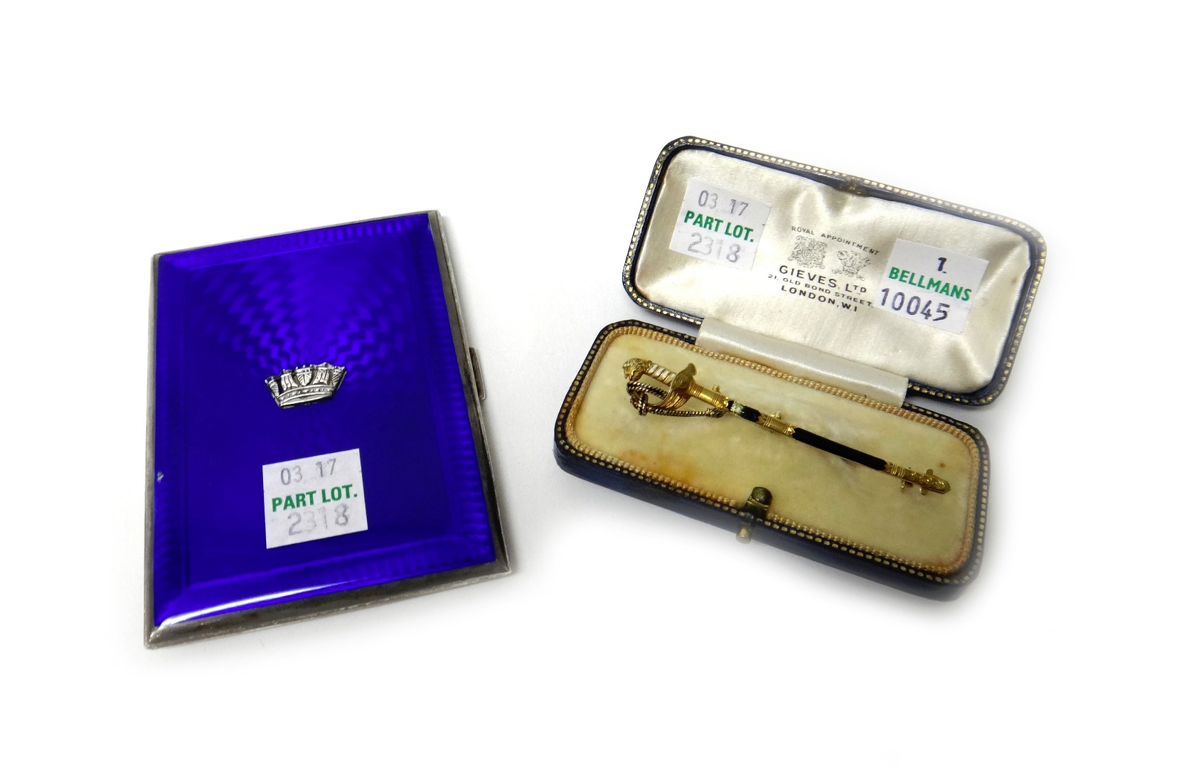 Appraisal: A gold and enamelled brooch designed as a Naval officer's