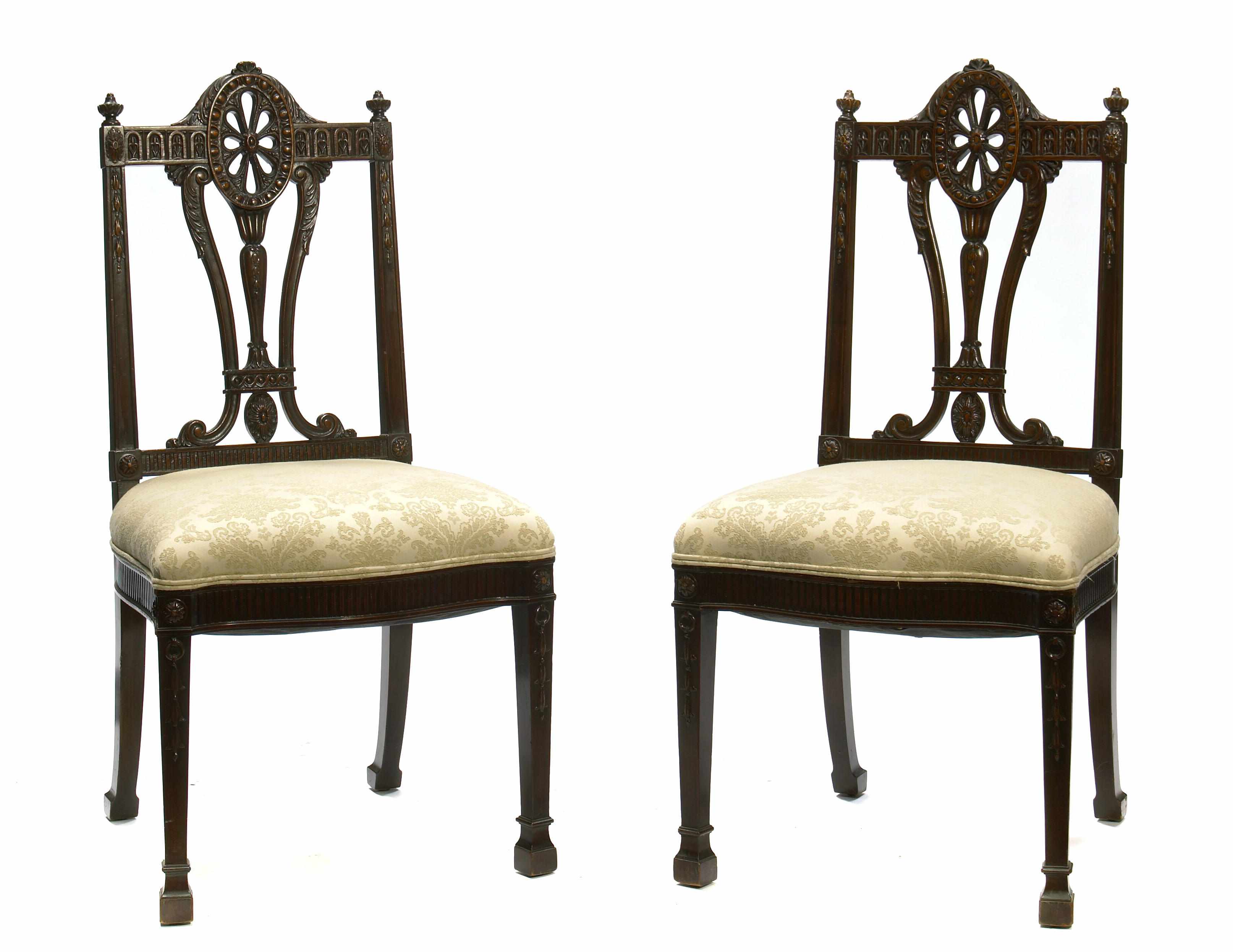 Appraisal: A set of twelve George III style carved mahogany dining