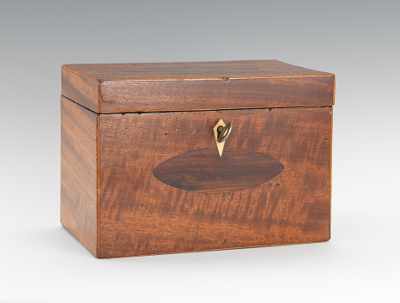 Appraisal: A Mahogany Tea Caddy Small rectangular wooden box with edge