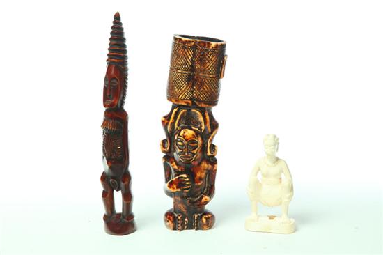 Appraisal: THREE CARVED IVORY FIGURES Africa early th century Three female