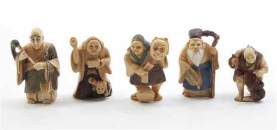 Appraisal: A Group of Five Ivory Netsuke each depicting a figure