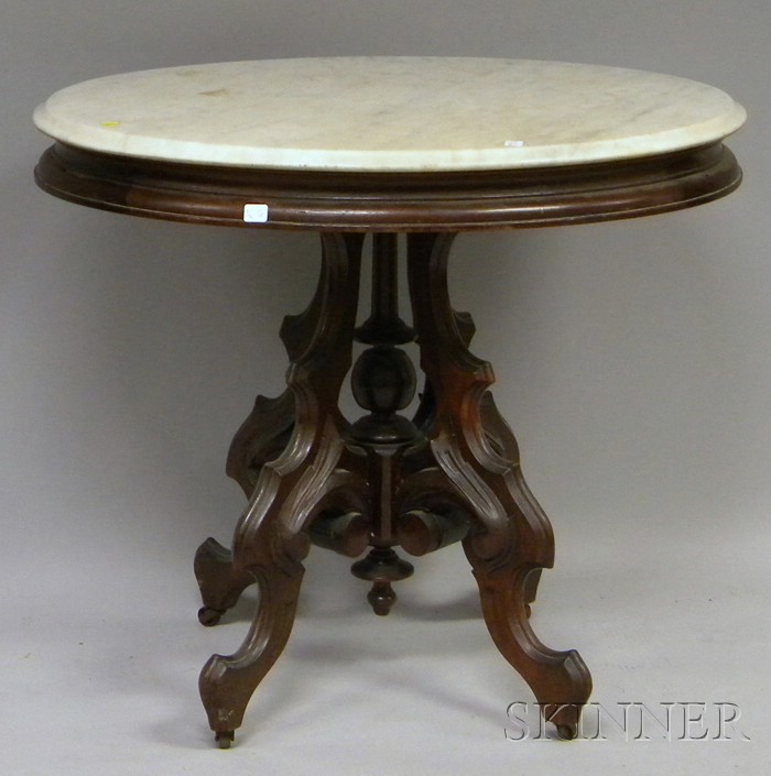 Appraisal: Victorian Renaissance Revival Oval White Marble-top Carved Walnut Occasional Table