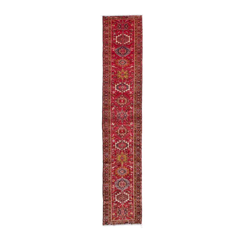 Appraisal: NORTHWEST PERSIAN RUNNER MODERN the indigo field with red medallion