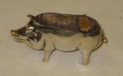 Appraisal: AN EDWARDIAN NOVELTY PIN CUSHION modelled as a pig Birmingham