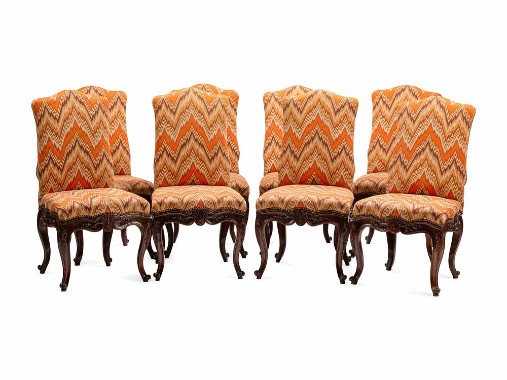 Appraisal: A Set of Eight Continental Carved Walnut Dining Chairs A