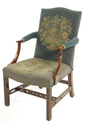 Appraisal: A library armchair in th century style the machine made