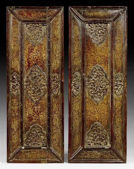 Appraisal: A PAIR OF CARVED AND LACQUERED SUTRA COVERS WITH GOLD