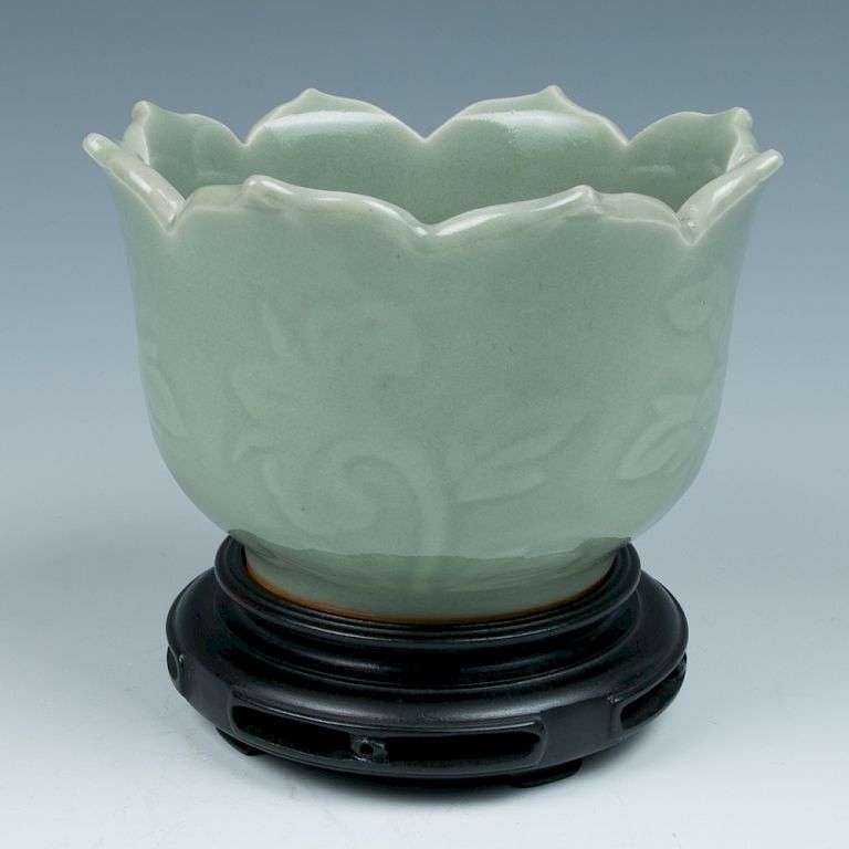 Appraisal: LONGQUAN CELADON FLORAL FORM VASE MING DYNASTY The vase of