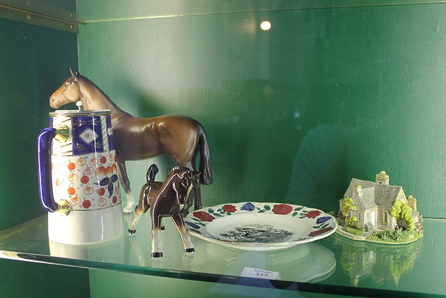 Appraisal: A BESWICK MODEL OF A HORSE 'The Winner' no together