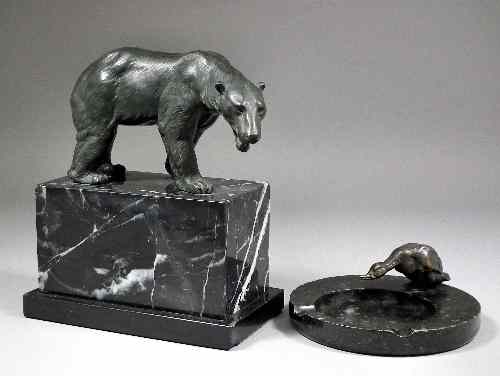 Appraisal: A green patination bronze figure of a Polar Bear on