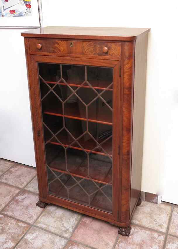 Appraisal: VICTORIAN WALNUT SINGLE DOOR BOOKCASE Single drawer over single door