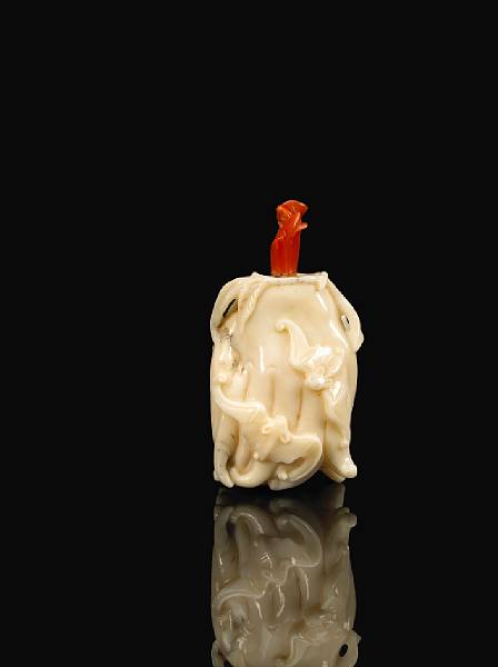 Appraisal: A white coral snuff bottle Carved to imitate the shape