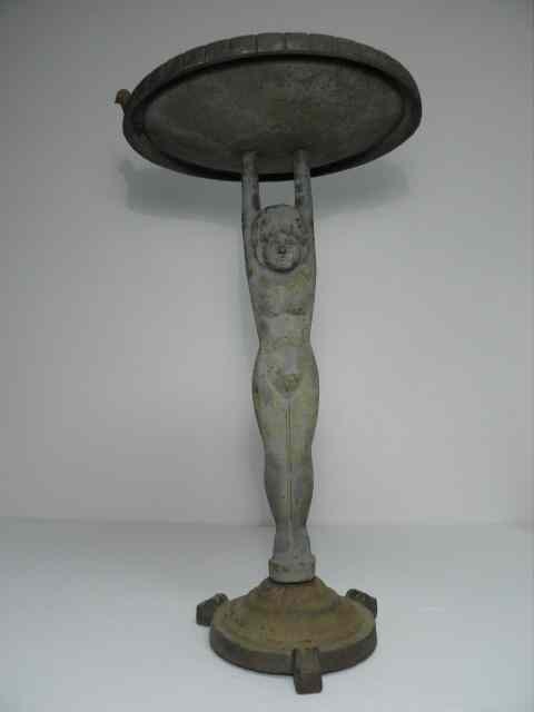 Appraisal: Heavy cast iron figural bird bath Bird bath support is