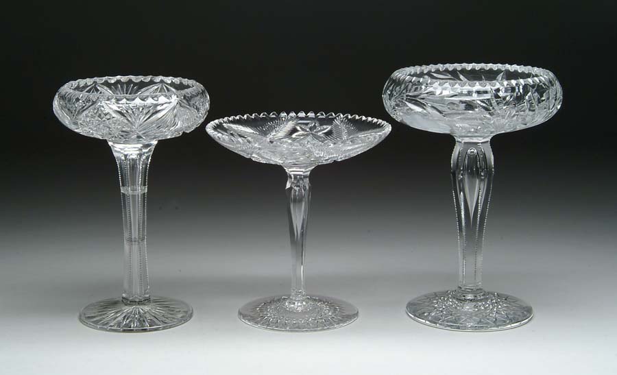 Appraisal: THREE CUT GLASS COMPOTES One cut in floral pattern one