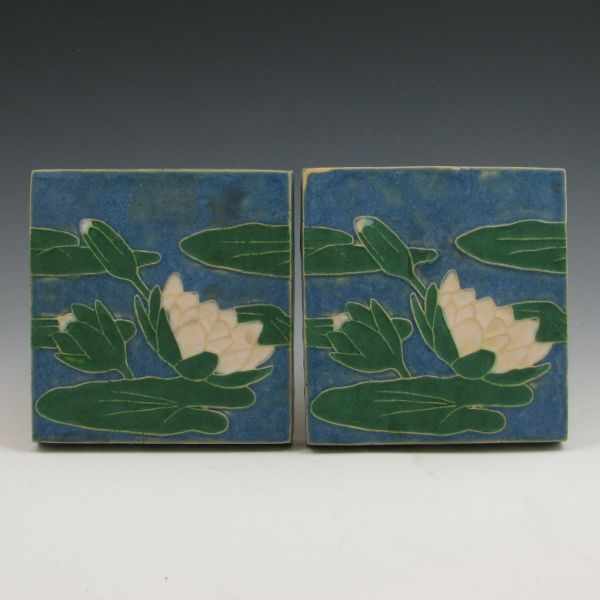 Appraisal: Two tiles with water lilies made in the style of