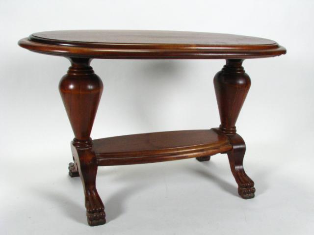 Appraisal: English antique oval console table with carved three-toe paw feet