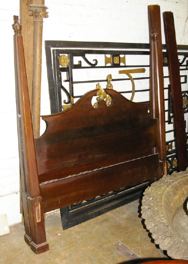 Appraisal: Early American-Style Mahogany Pencil-Post Bedstead with an arched broken-pediment headboard