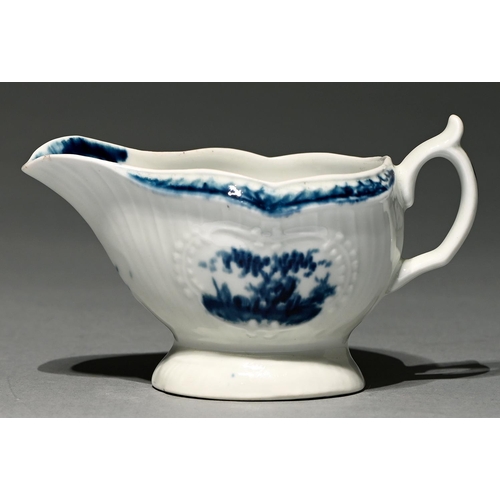 Appraisal: A Worcester blue and white sauceboat c strap fluted and