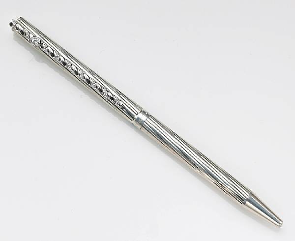 Appraisal: A diamond and sterling silver ballpoint pen S T Dupont