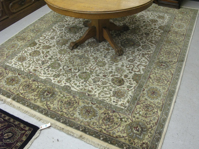 Appraisal: HAND KNOTTED ORIENTAL CARPET Indo-Persian overall scrolling floral raceme decoration