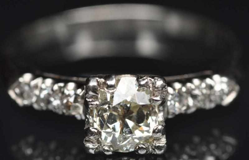 Appraisal: Platinum Diamond Engagement Ring Diamond points With six smaller diamonds