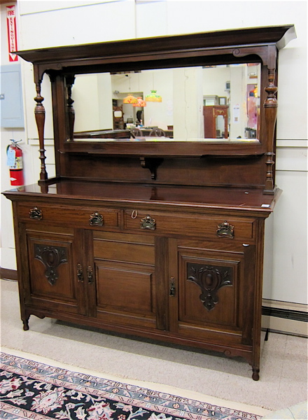 Appraisal: CARVED MAHOGANY SIDEBOARD English early th century having a mirror-paneled