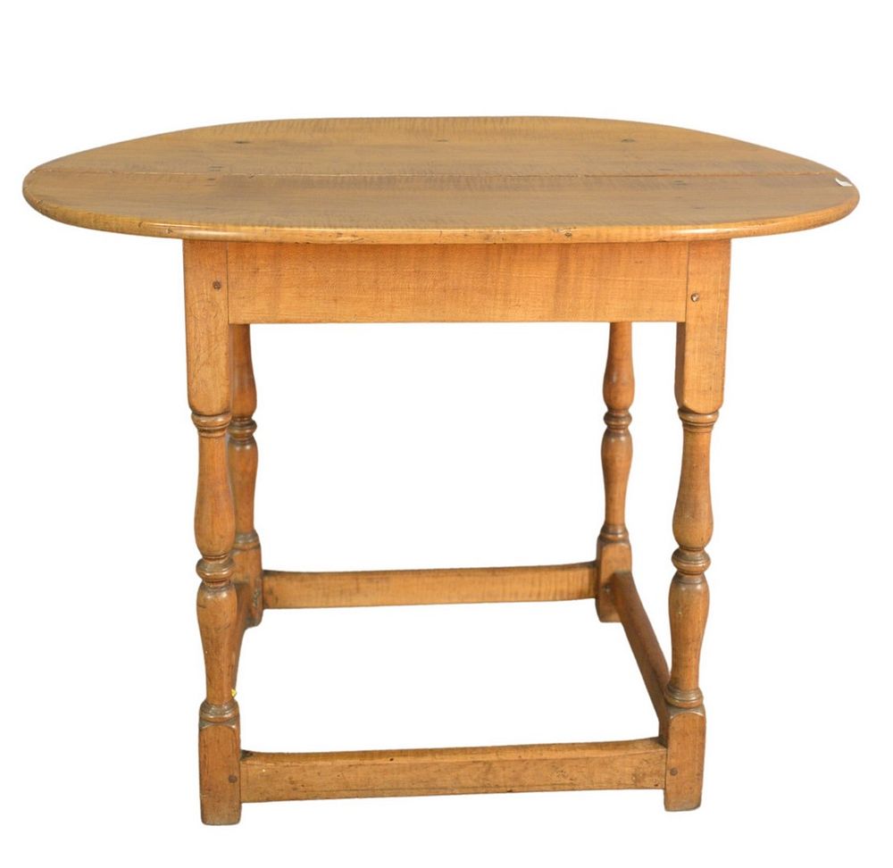 Appraisal: Tavern Table with oval tiger maple top on block and