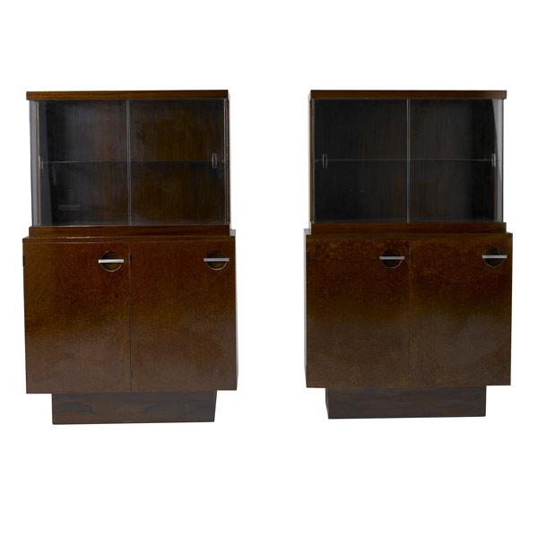 Appraisal: GILBERT ROHDE HERMAN MILLER Pair of mahogany burled walnut and