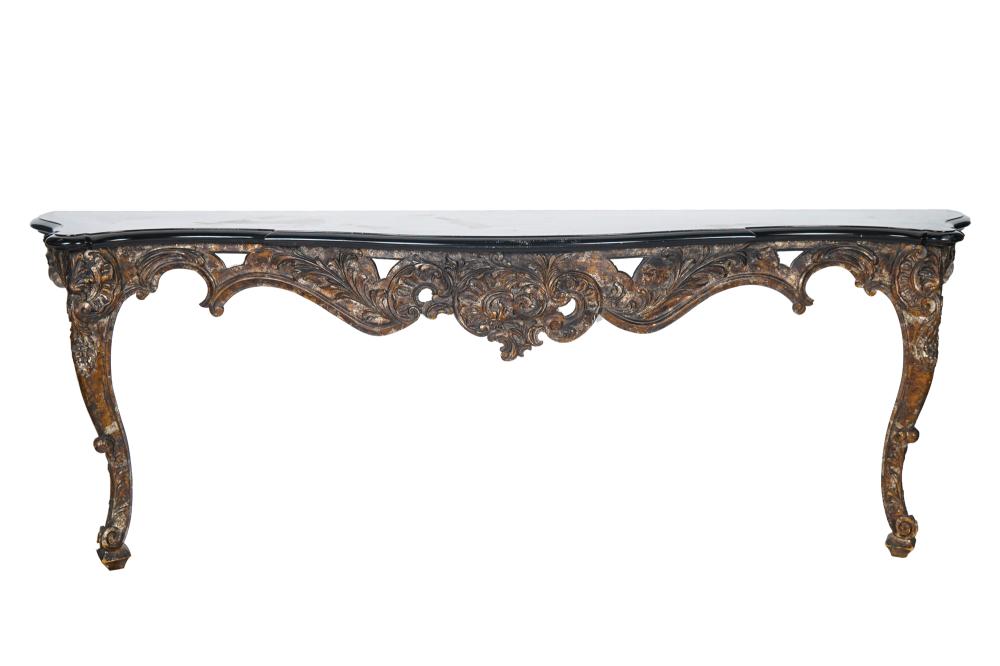 Appraisal: ITALIAN ROCOCO STYLE GILT CARVED WOOD CONSOLE TABLEwith a black-lacquered