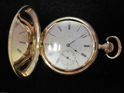 Appraisal: karat yellow gold pocket watch ElginCircular case white enamel face