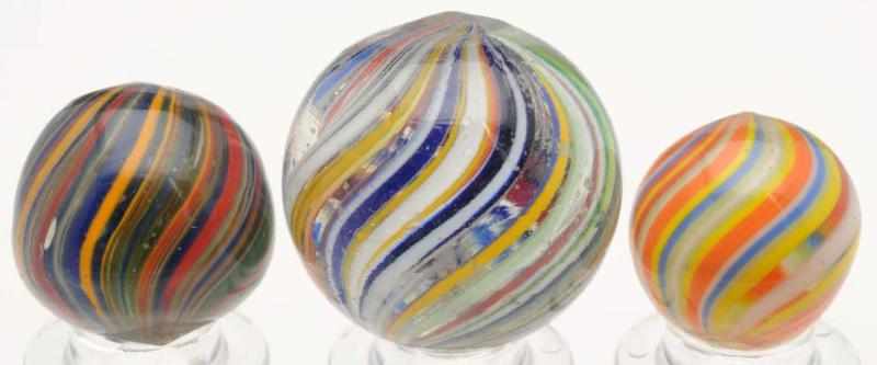 Appraisal: Lot of Joseph's Coat Swirl Marbles The largest is a