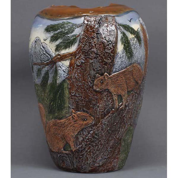 Appraisal: Hand Thrown deeply carved detailed woodland Scene Floor Vase by